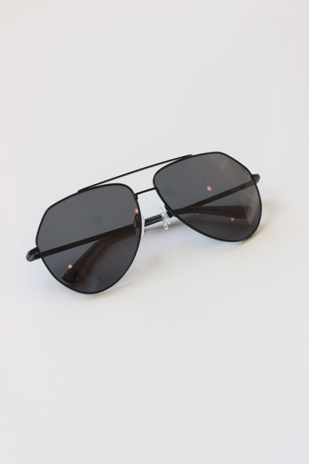 Stylish and sophisticated Harbor Black Aviator Sunglasses. Perfect for fashion-forward individuals. Designed in house with precision and care.