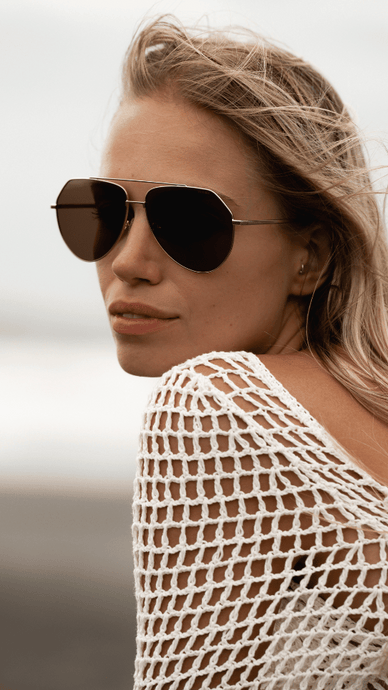 ANEA HILL's Sail Silver Aviator Sunglasses: sleek frame, silver-tone metal detailing, dark-gray tinted lenses - the ultimate luxury accessory.