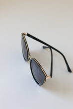 Load image into Gallery viewer, These top-of-the-line sunglasses are crafted with precision and attention to detail, with a sturdy metal frame and UV-protective lenses.

