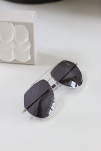 Sail Silver Aviator Sunglasses: luxury sunglasses, dark lenses, exquisite details.